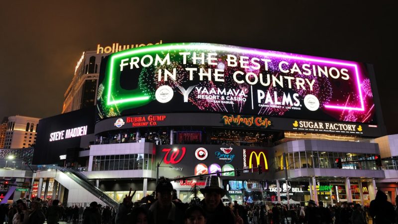 Glowing online casino interface on a dark screen showing global expansion map with neon highlights